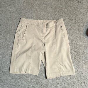 Izod beige stretch golf shorts. Size 12